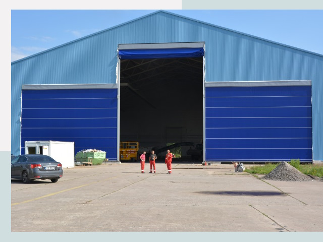 Ангарные ворота в Мурманск от СтальСтрой-Мрм по цене 617 руб.